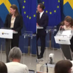 Suécia: ministra da Saúde passa mal e desmaia durante posse. Vídeo